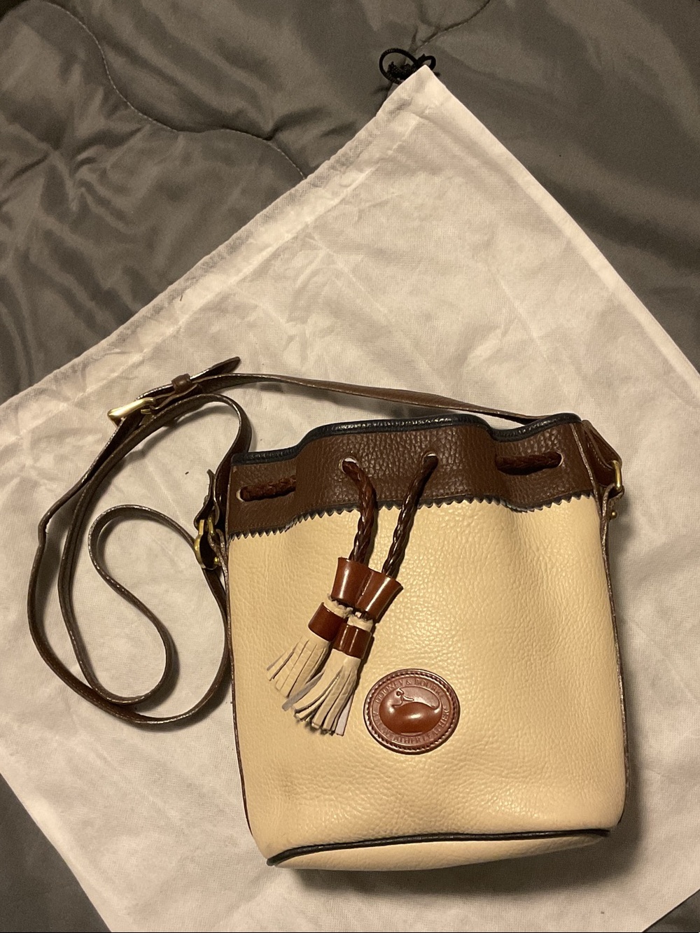 Dooney & Bourke Vintage Cream and Brown Leather Drawstring Duffel Crossbody